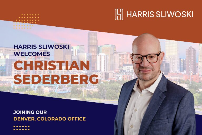 A man in a suit and glasses stands in front of a cityscape with text welcoming Christian Sederberg to Harris Sliwoski’s Denver, Colorado office.